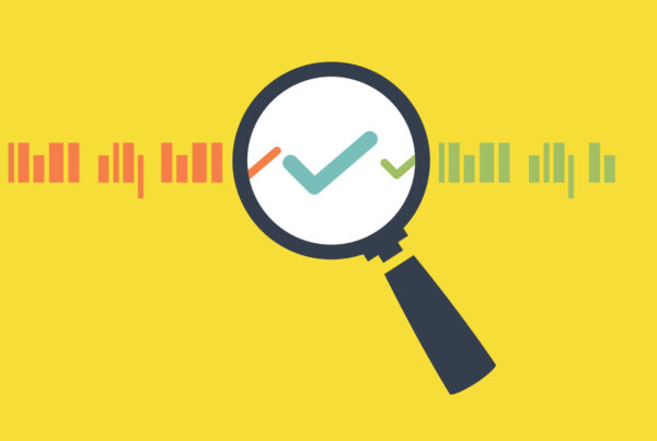 magnifying glass looking over data